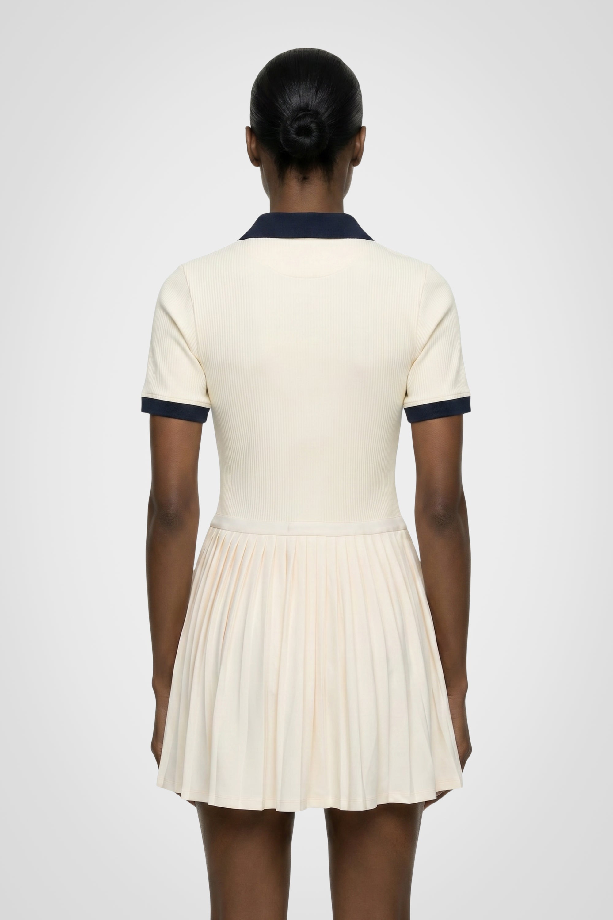 Courtline Pleated Polo Dress